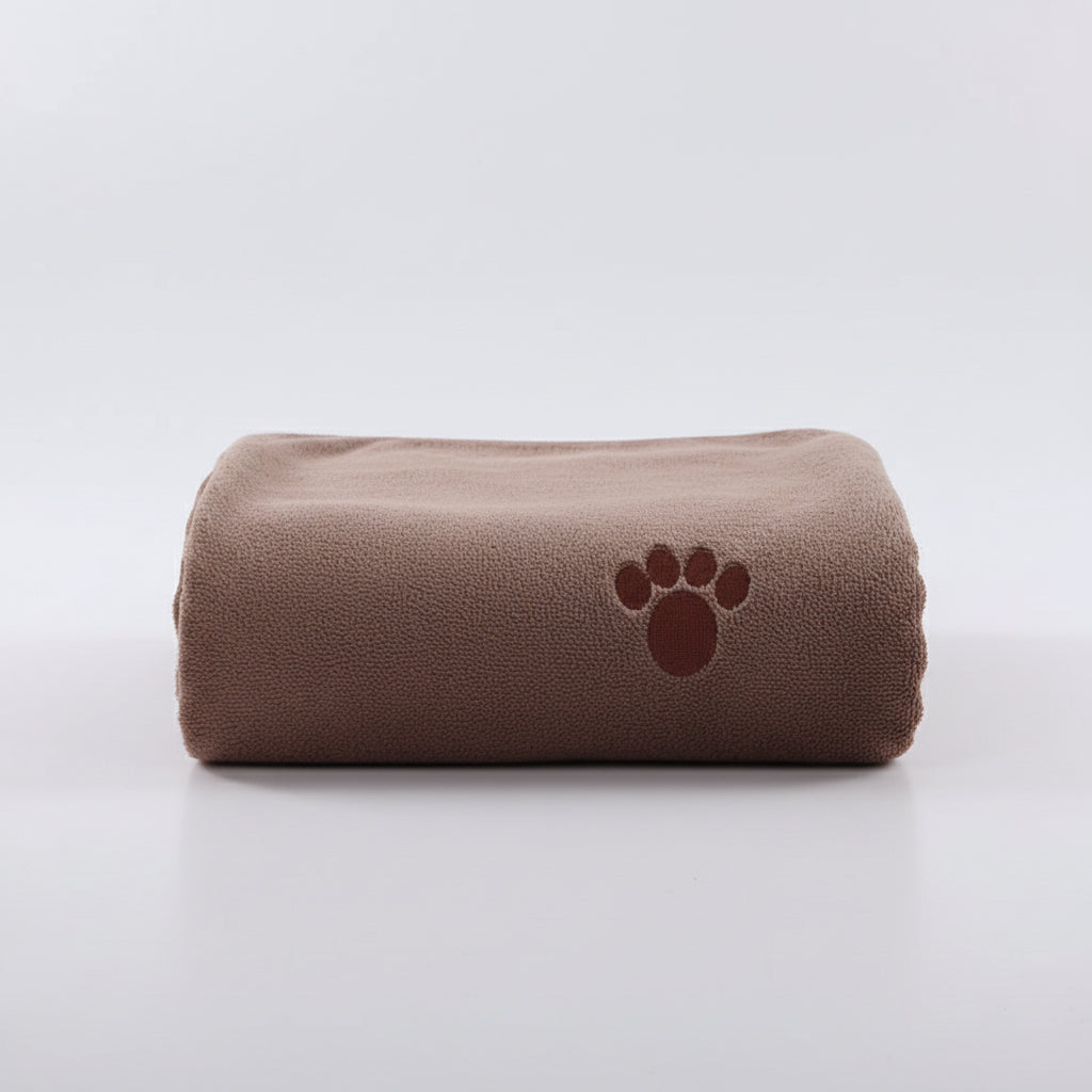 Quick-dry towel, brown rolled with dark paw-print emblem