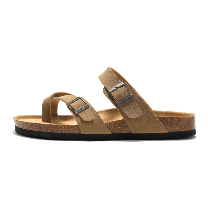 Women's cork sandals in camel with two adjustable buckle straps, side angle.