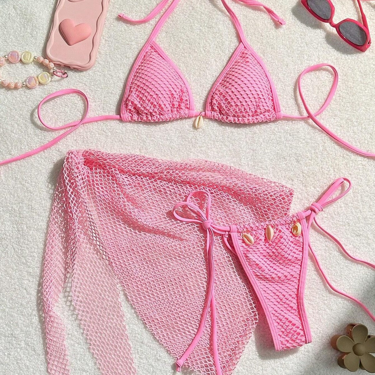 Light pink three-piece split bikini set with triangle top, tie bottoms, and mesh skirt