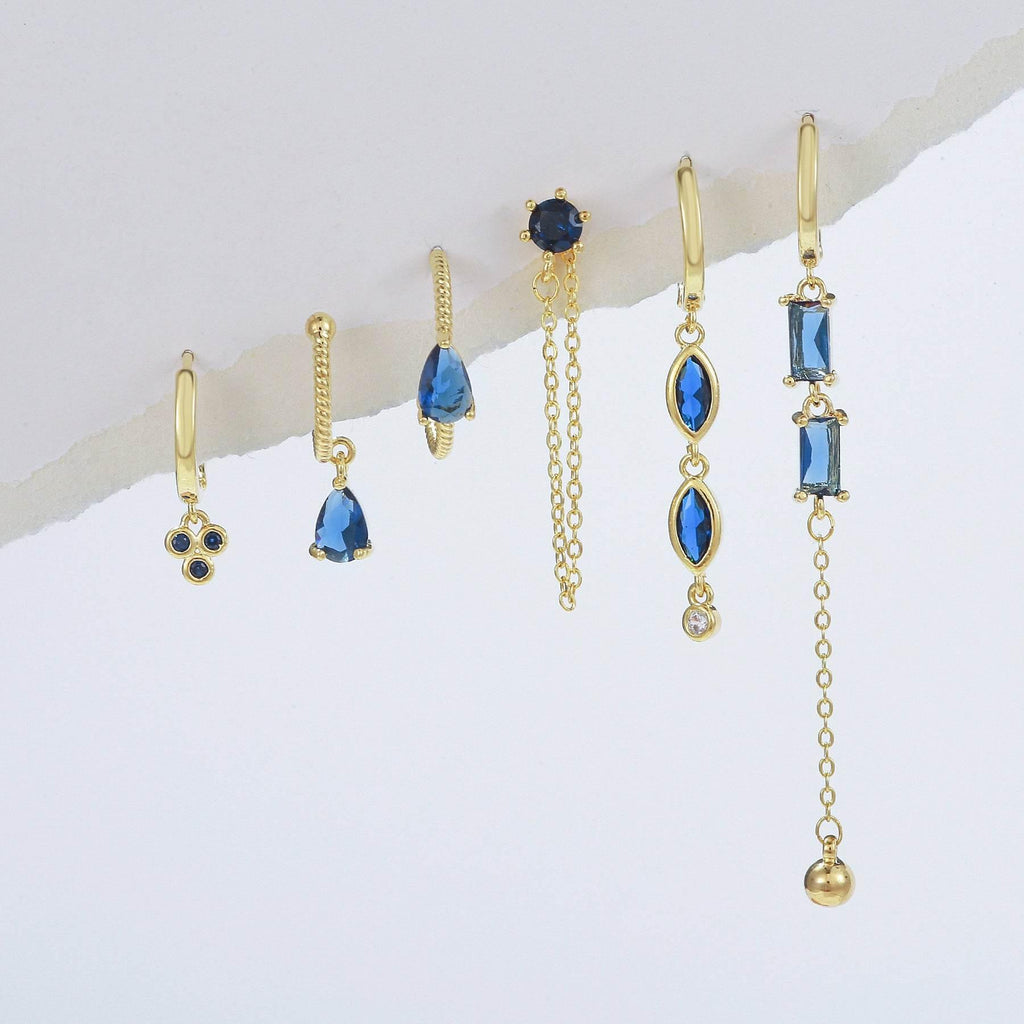 Gold-tone long drop earrings with blue stones and fine chain tassels