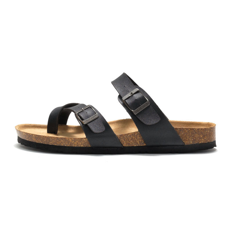 Women's cork sandals in black with two adjustable buckle straps, side profile.