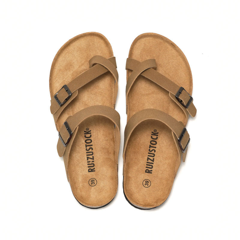 Women's cork sandals in tan-brown with two buckles; top view of straps and insole.