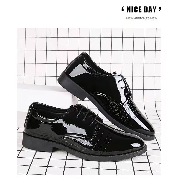 Black leather lace-up Oxford shoes with glossy finish and crocodile-pattern toe
