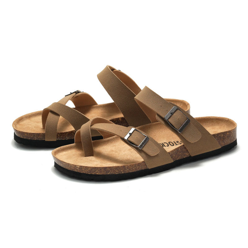 Women's cork sandals in brown with two adjustable buckle straps.