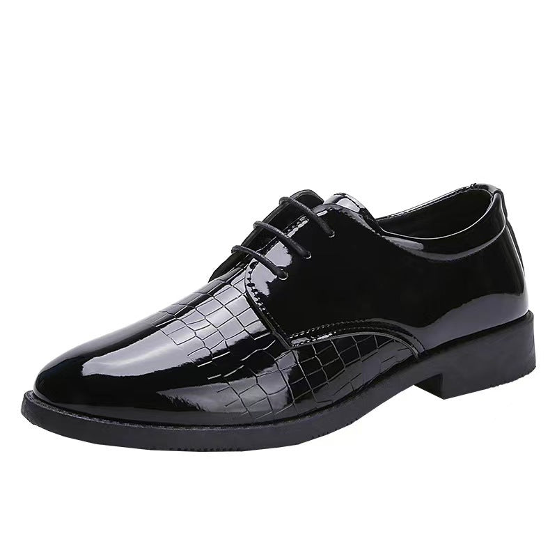Black glossy leather lace-up Oxford shoes with crocodile-pattern paneling and flat sole