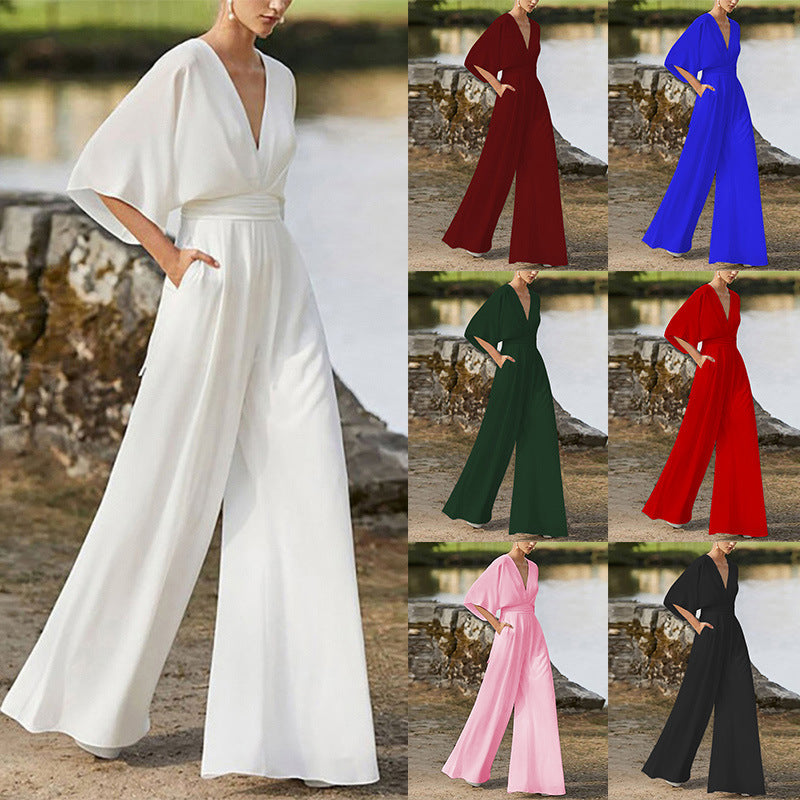 White deep V wide-leg jumpsuit with high waist sash