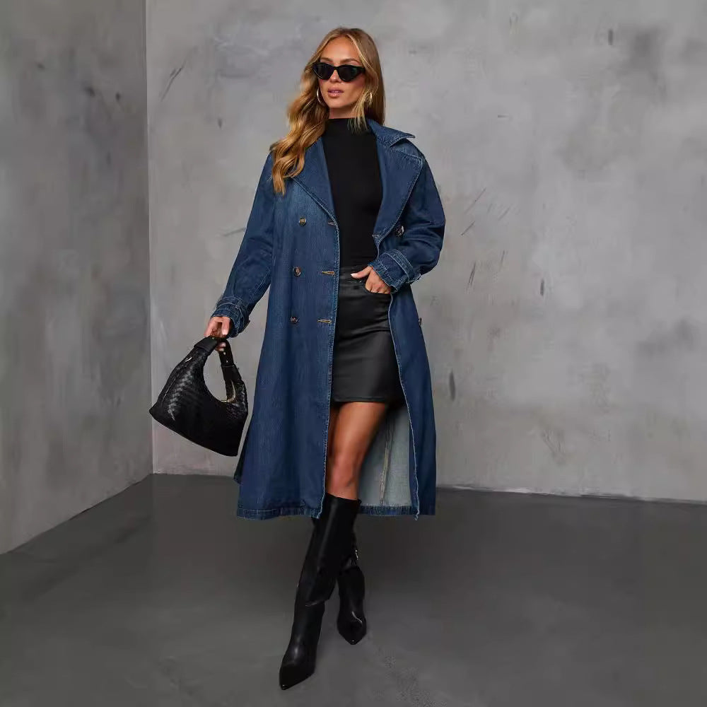 Navy denim belted coat with long sleeves, button front, and wide A-line hem