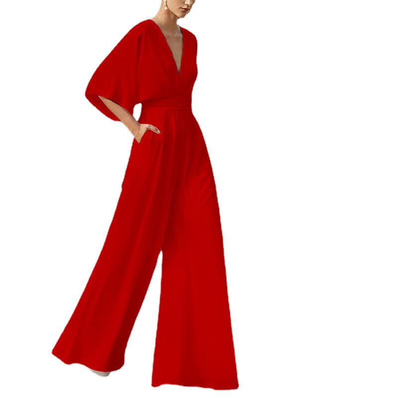 Red deep V wide-leg jumpsuit with high waist sash