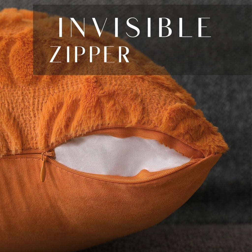 Orange faux fur pillow cover with invisible zipper opening at side seam