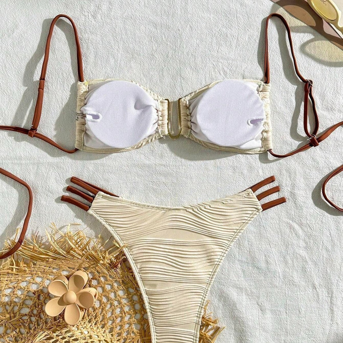 Ivory ruched three-piece bikini set with brown string straps and high-cut bottoms