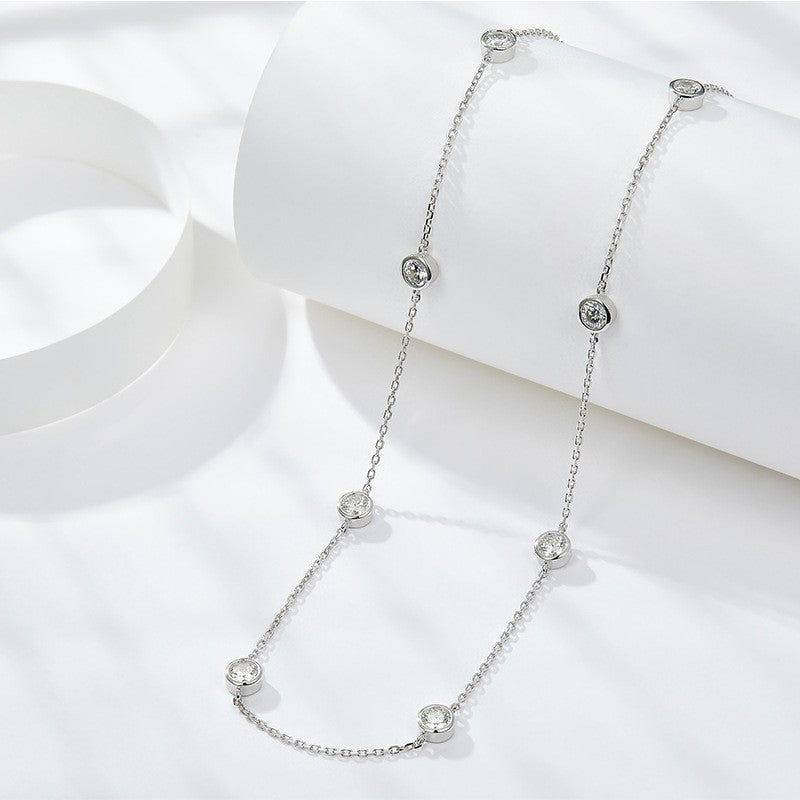 Two moissanite bubble bracelets with round stones on silver-tone chain