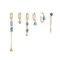 Gold-tone long tassel earrings set with blue teardrop stones and chain dangles