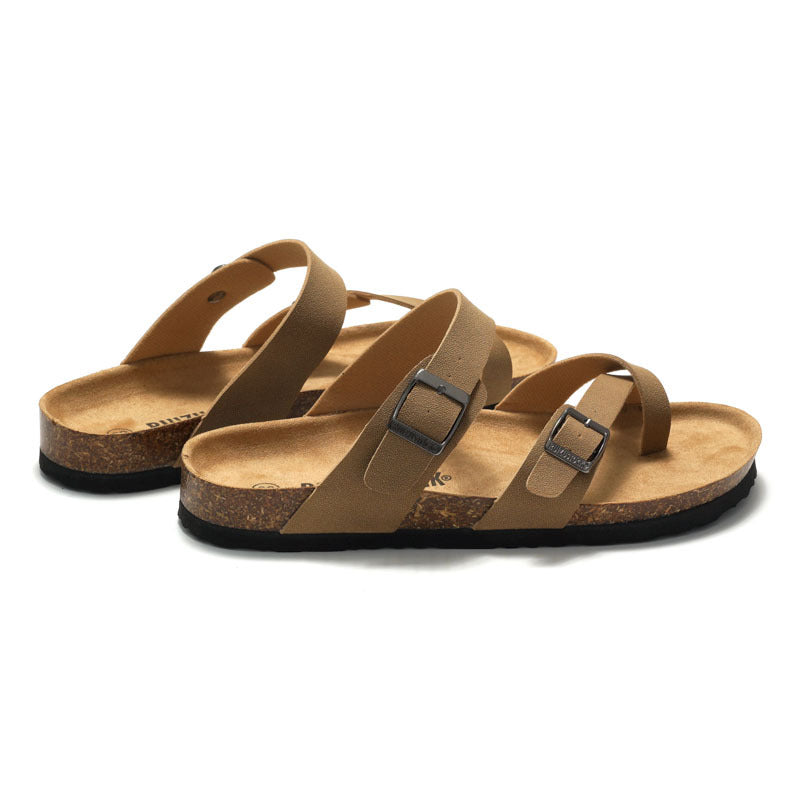 Women's cork sandals in tan-brown with two buckled cross straps, side angle view.