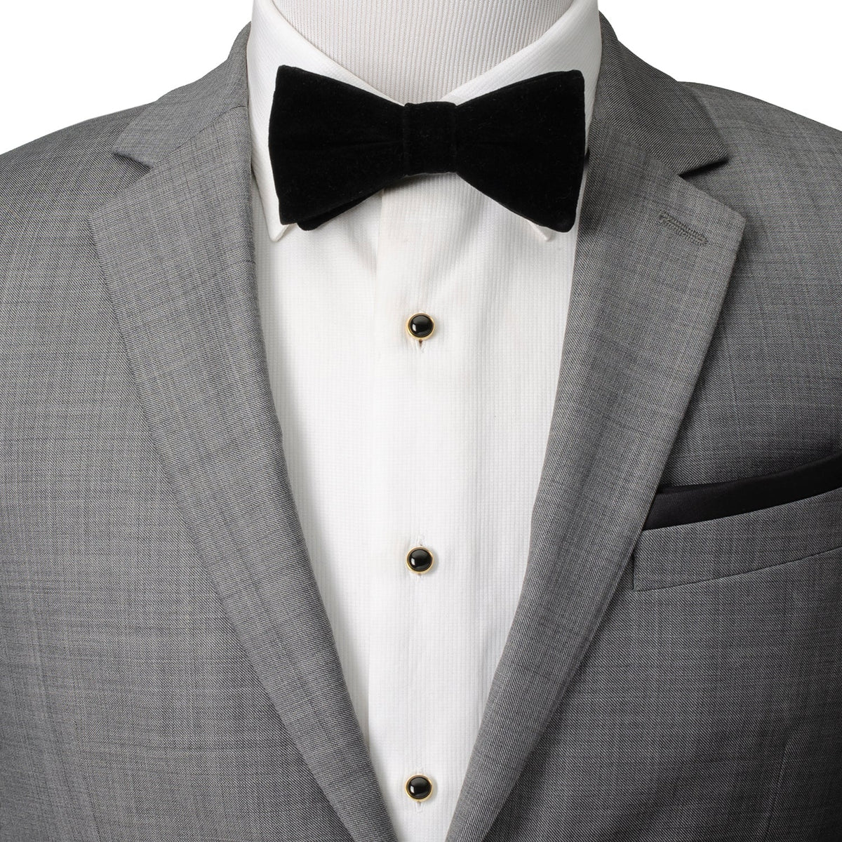 Black onyx shirt studs on white dress shirt with black bow tie