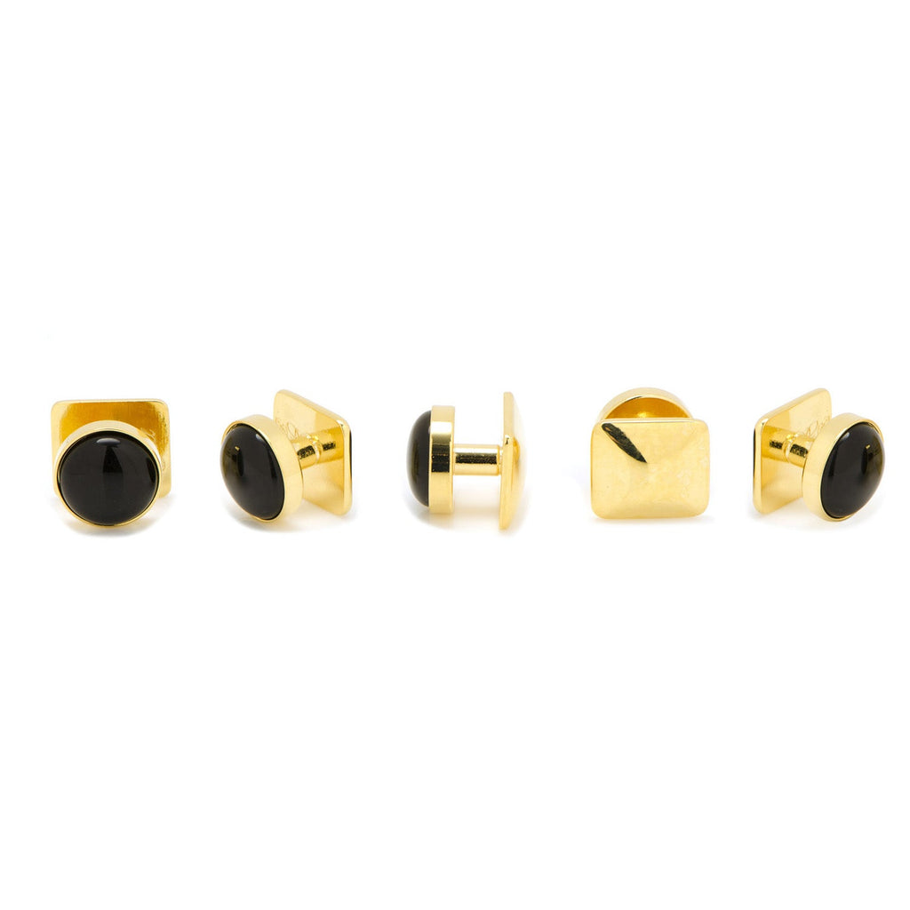 Gold-tone shirt studs with black onyx round heads, side view