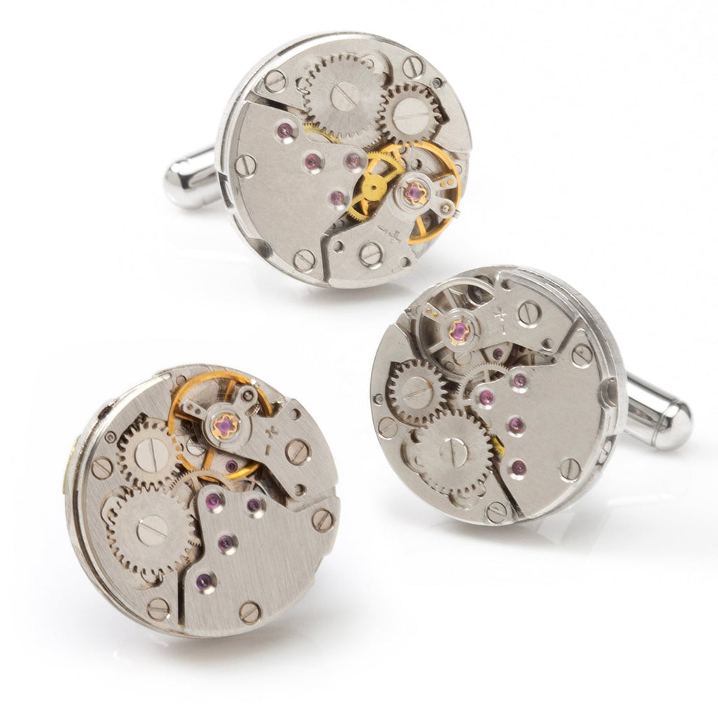 Skeleton watch-movement cufflinks with silver-tone round gear designs and purple jewels