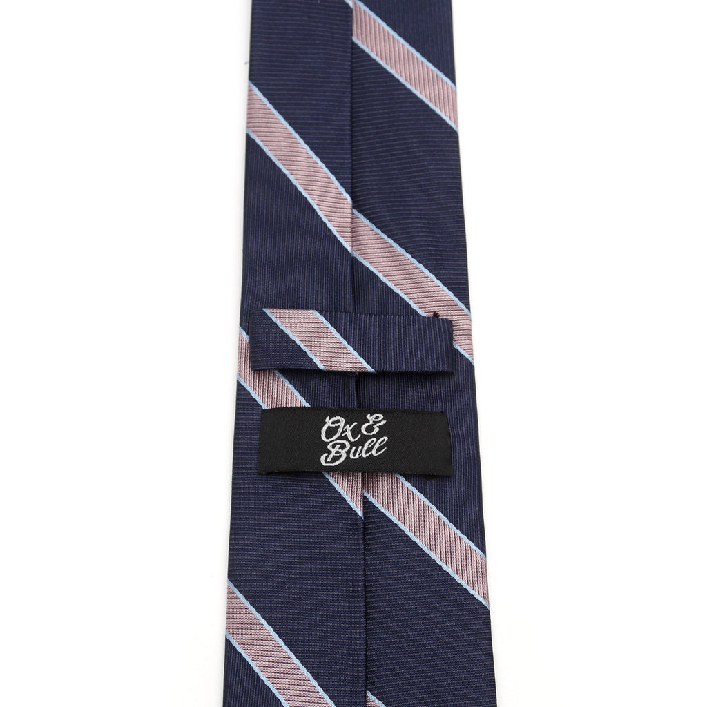 Navy striped necktie with light pink diagonal stripes and Ox & Bull tag