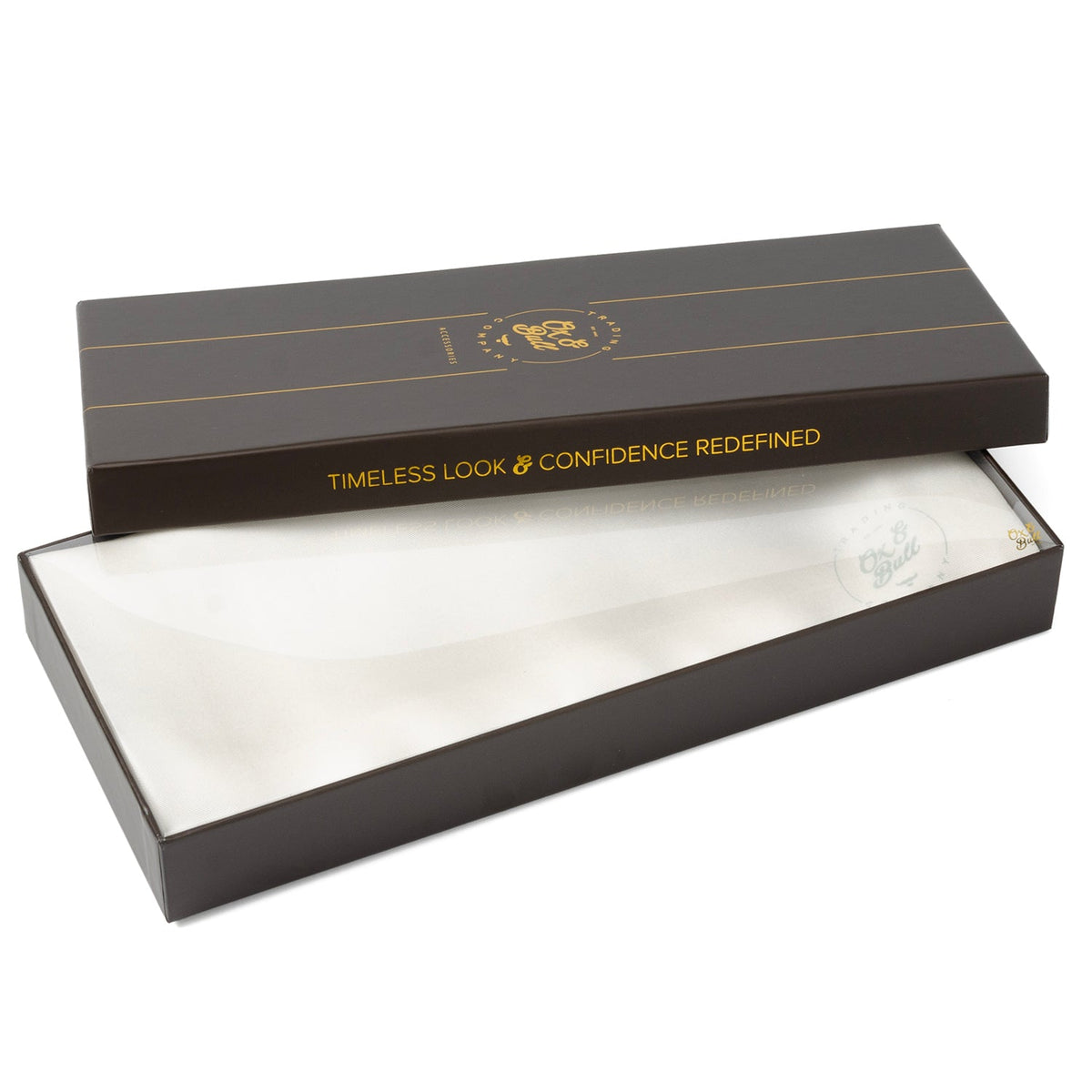 White silk tuxedo scarf inside open gift box, satin fabric visible