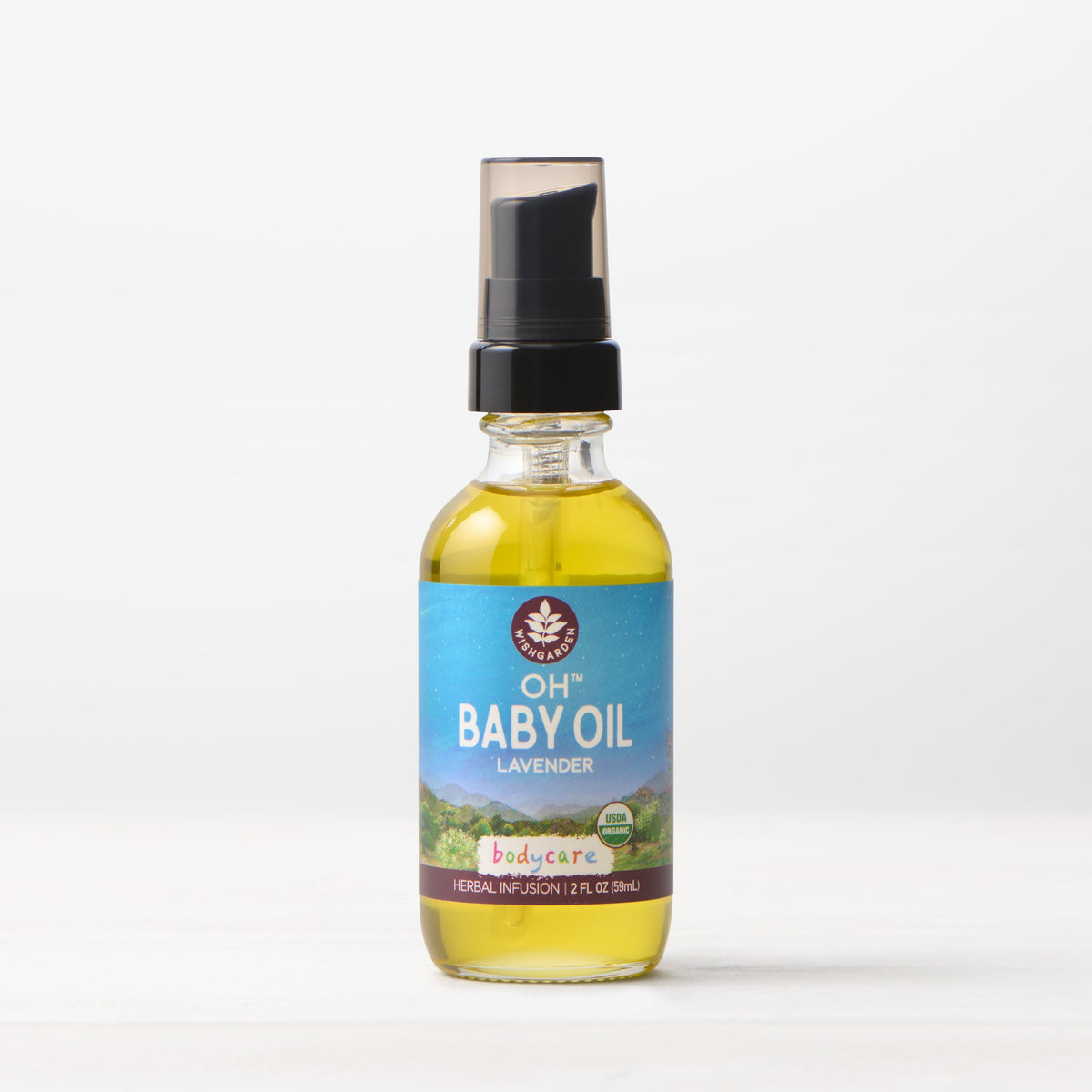 Lavender baby oil bottle with pump-style black cap and glass dropper nozzle