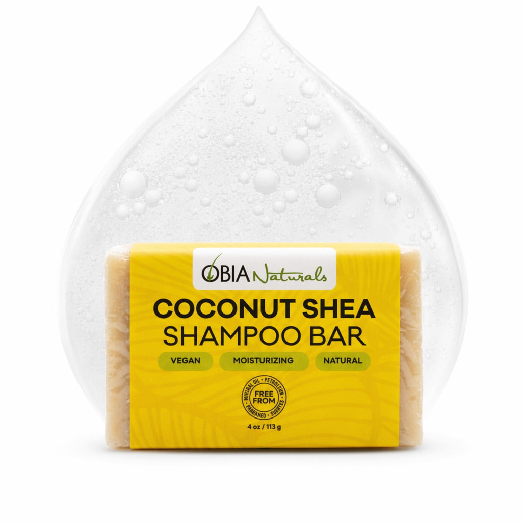 Yellow Coconut Shea shampoo bar from OBIA Naturals with bar-shaped soap and drops
