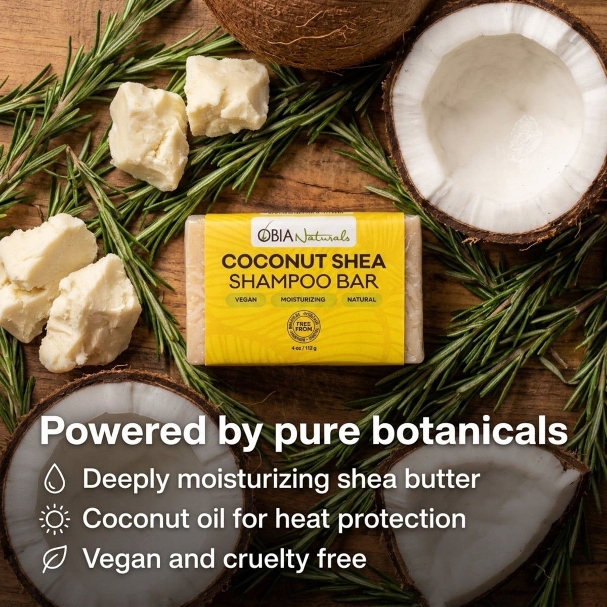 Coconut Shea shampoo bar by OBIA Naturals on wood with coconut halves and shea pieces