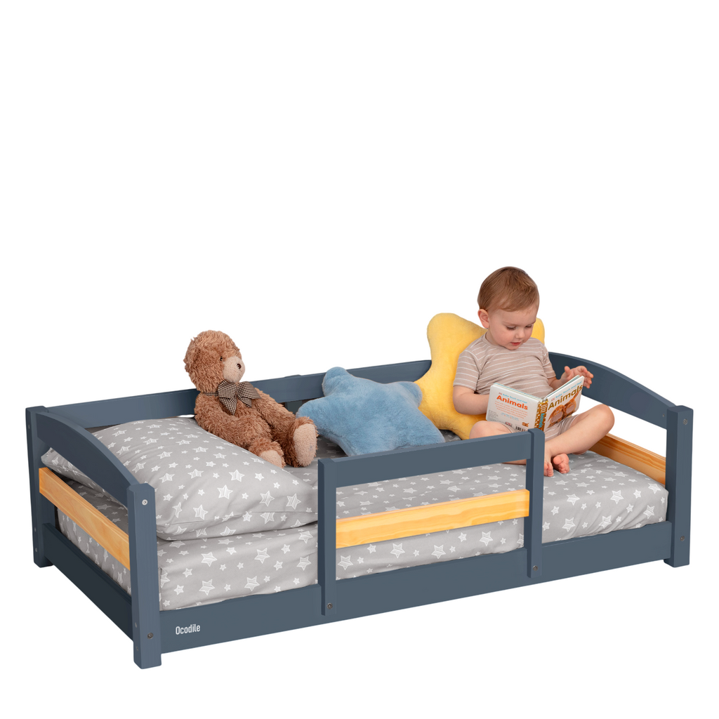 Toddler floor bed with safety rails, dark gray frame and gray star mattress