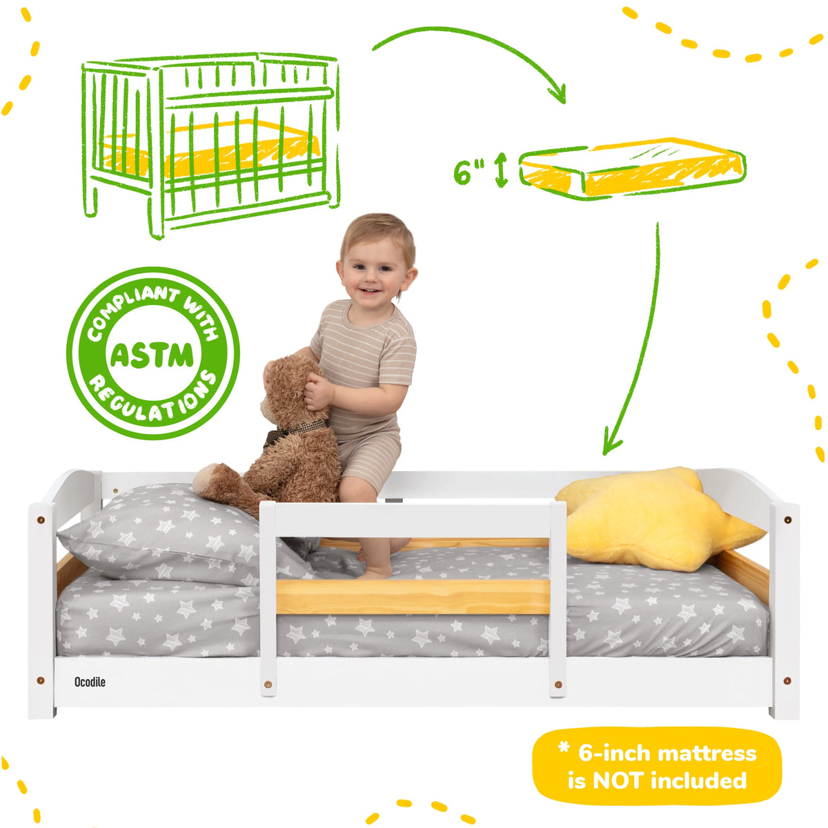 Toddler floor bed with safety rails, white frame and gray star mattress