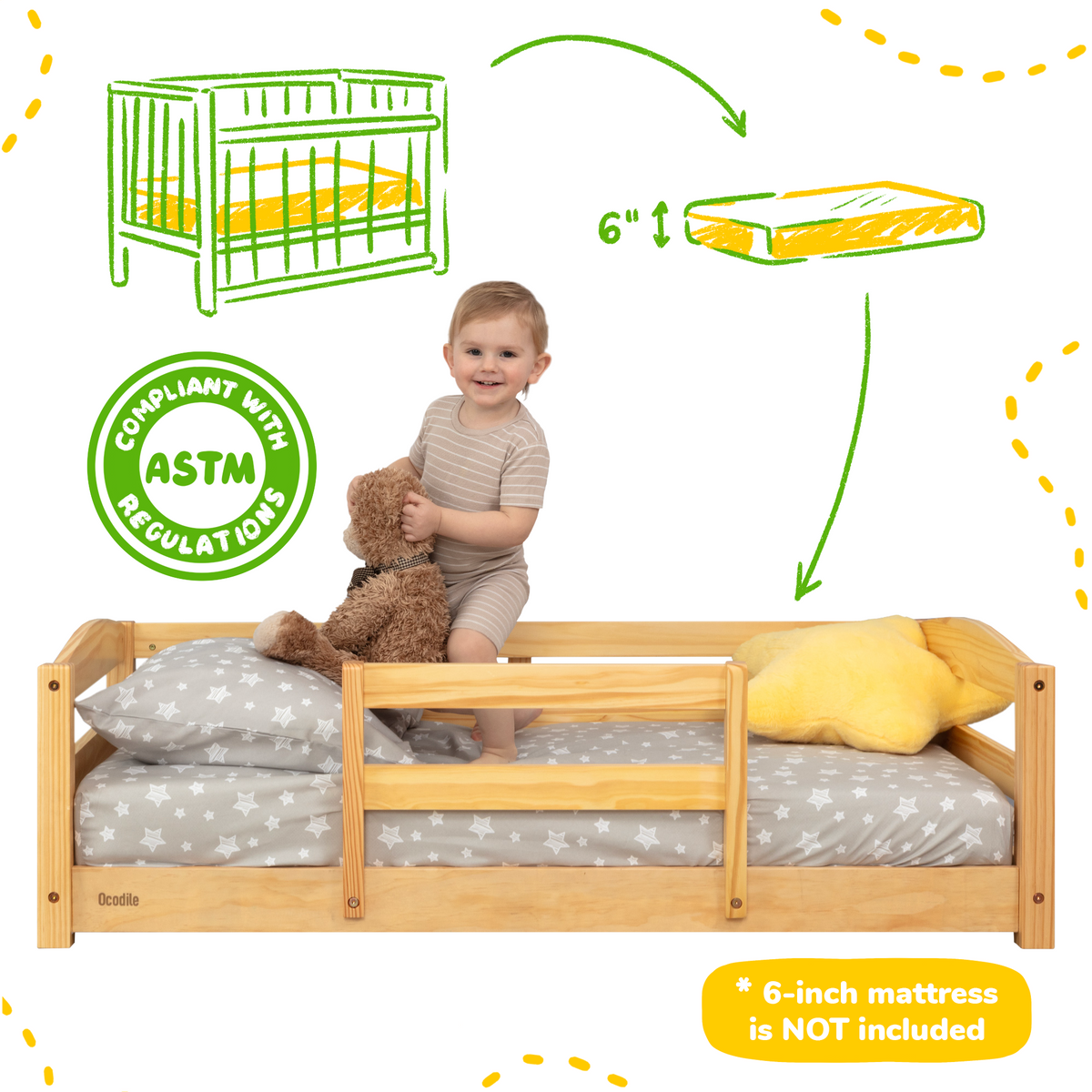 Toddler floor bed with safety rails, light wood frame and gray star mattress