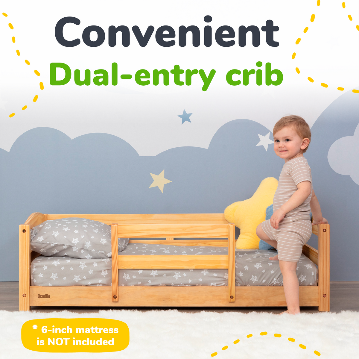 Toddler floor bed with safety rails, natural wood frame and gray star bedding
