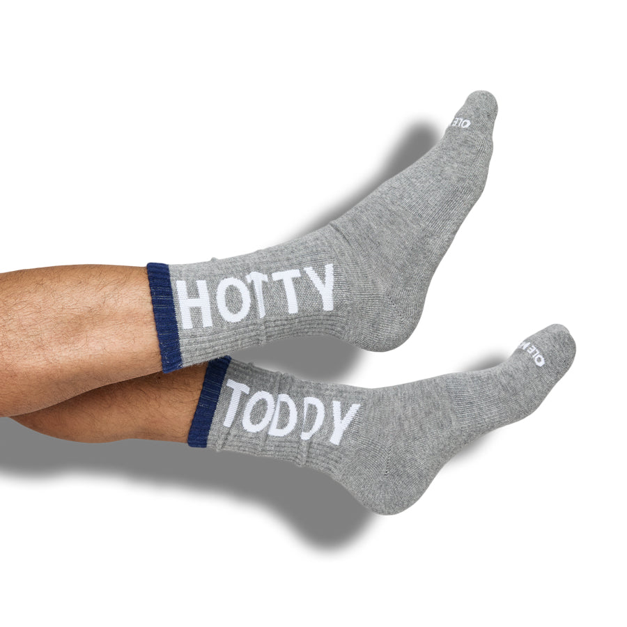 Gray crew socks with Ole Miss “HOTT” and “TODDY” text on the cuffs