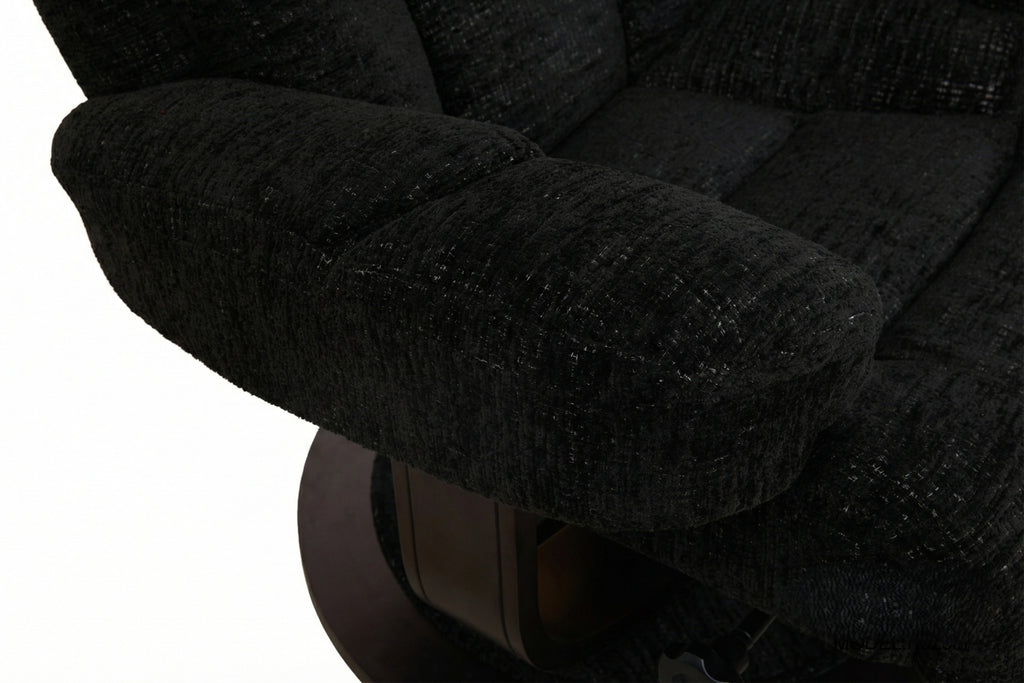 Close-up of dark upholstered recliner arm and seat padding