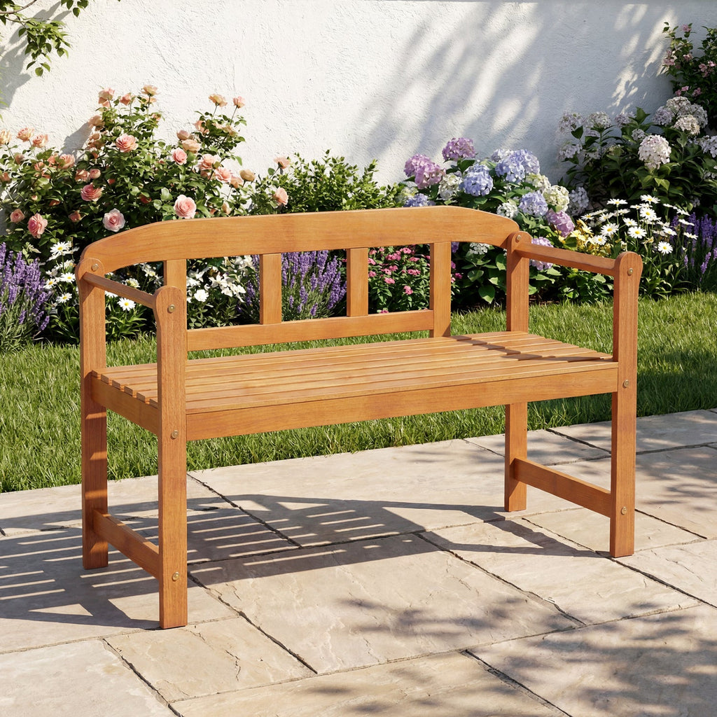 Acacia wood garden bench with backrest and armrests, slatted seat in natural tan.