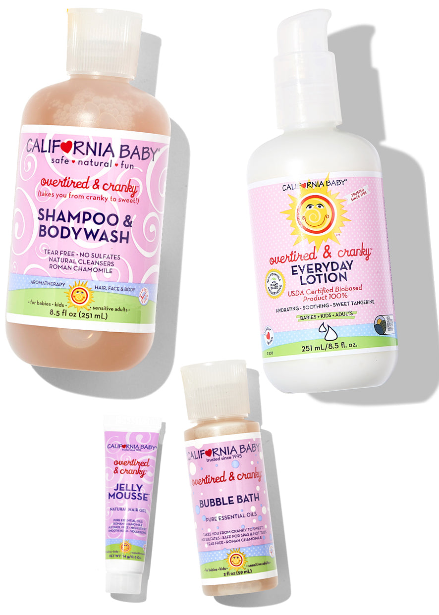 Baby skincare gift set with four bottles: shampoo, eye lotion, bubble bath, jelly mousse