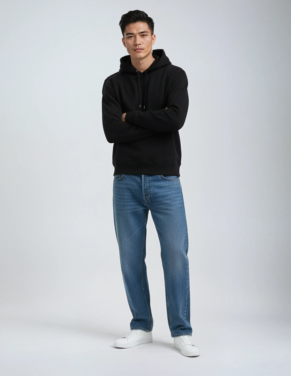 Black heavyweight pullover hoodie with drawstring hood and kangaroo pocket, full front view