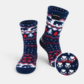 Navy crew socks with polar bear and pine tree design, plus red bow pattern on foot