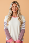 White and mauve striped patchwork dolman sleeve sweatshirt with pink ribbed trim