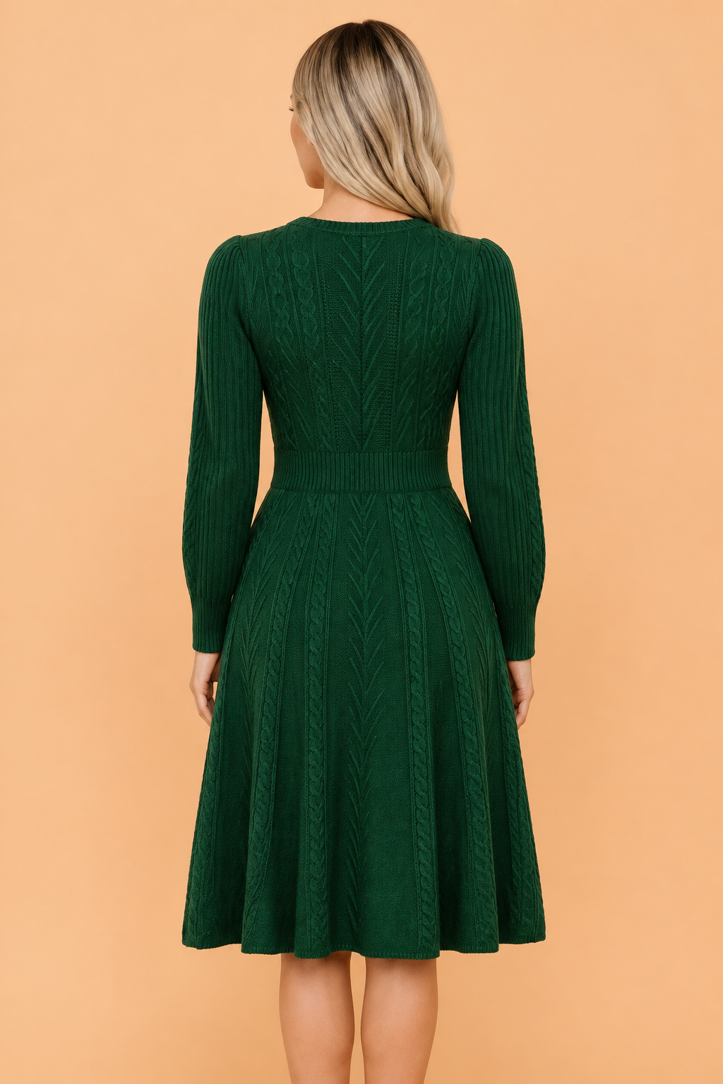 Dark green cable-knit mini sweater dress, back view with long sleeves and flared skirt.