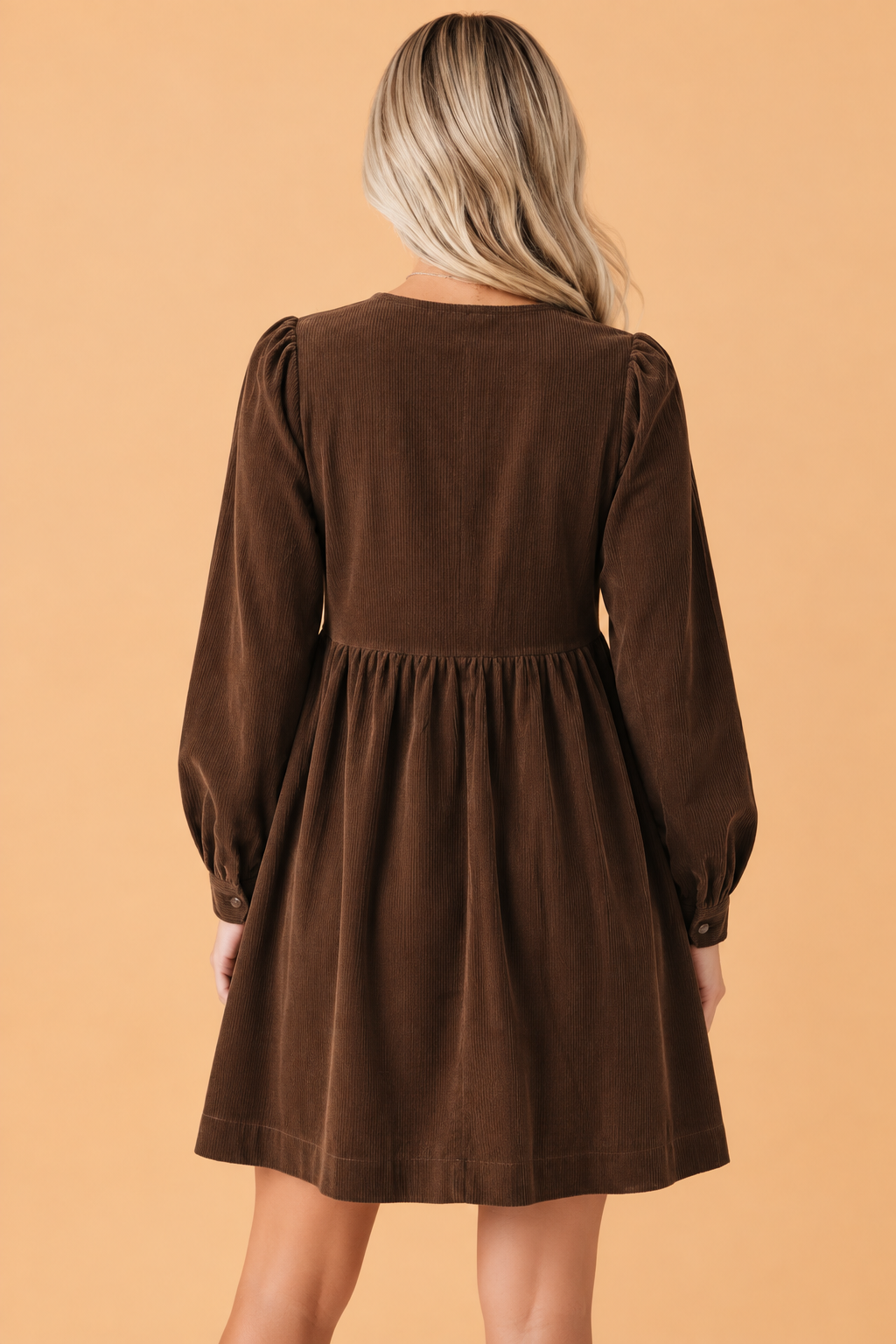 Coffee corduroy mini dress with long sleeves, gathered back yoke and skirt