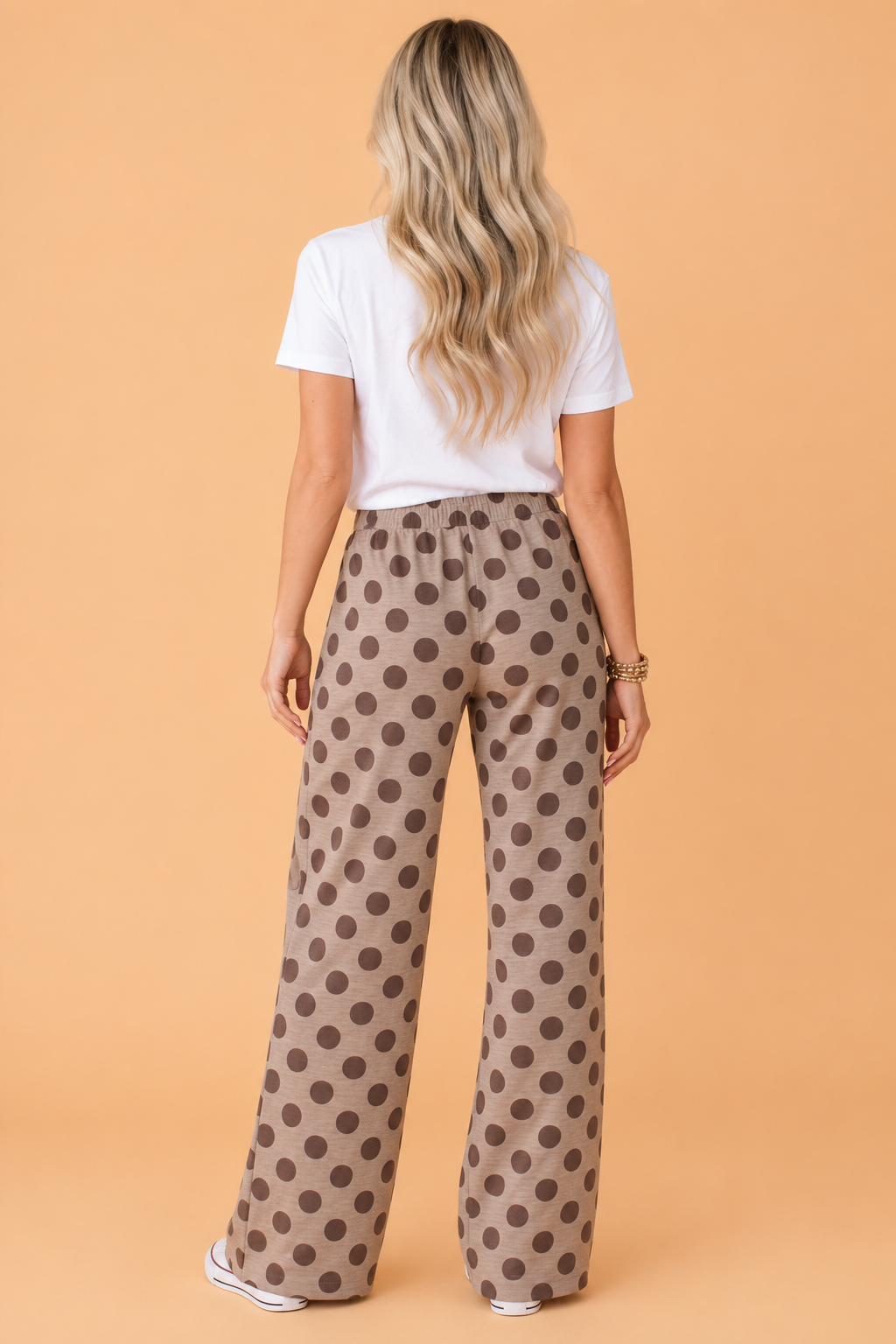 Brown polka dot wide-leg elastic waist pants with patch pockets, relaxed fit
