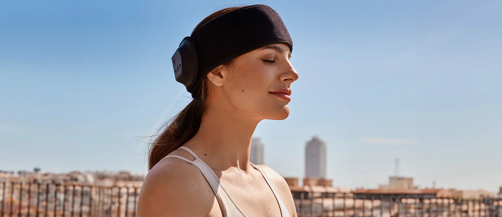 Black NeuroWrap headband worn by woman in side profile