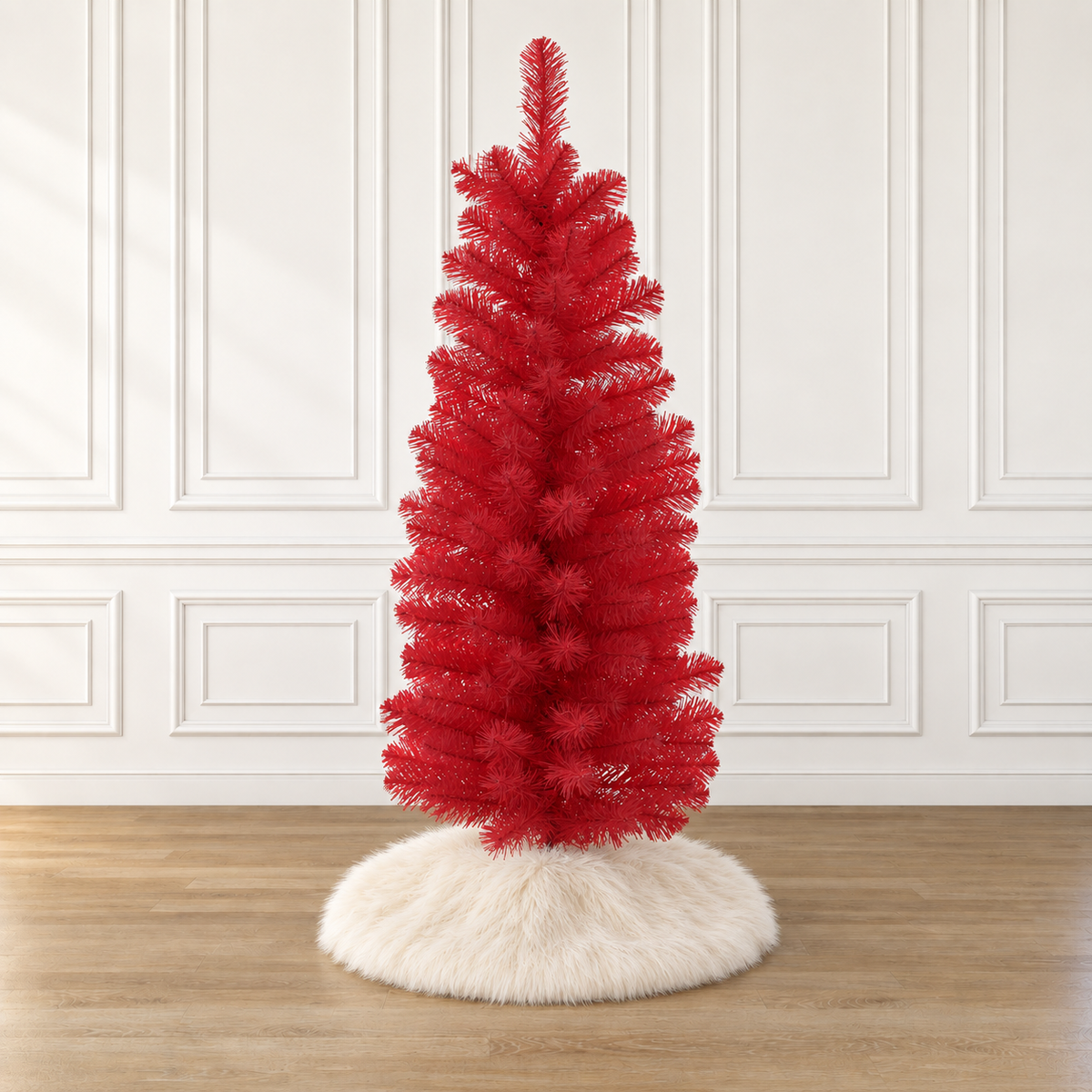 Red tabletop pencil Christmas tree with white flocked base and plastic stand