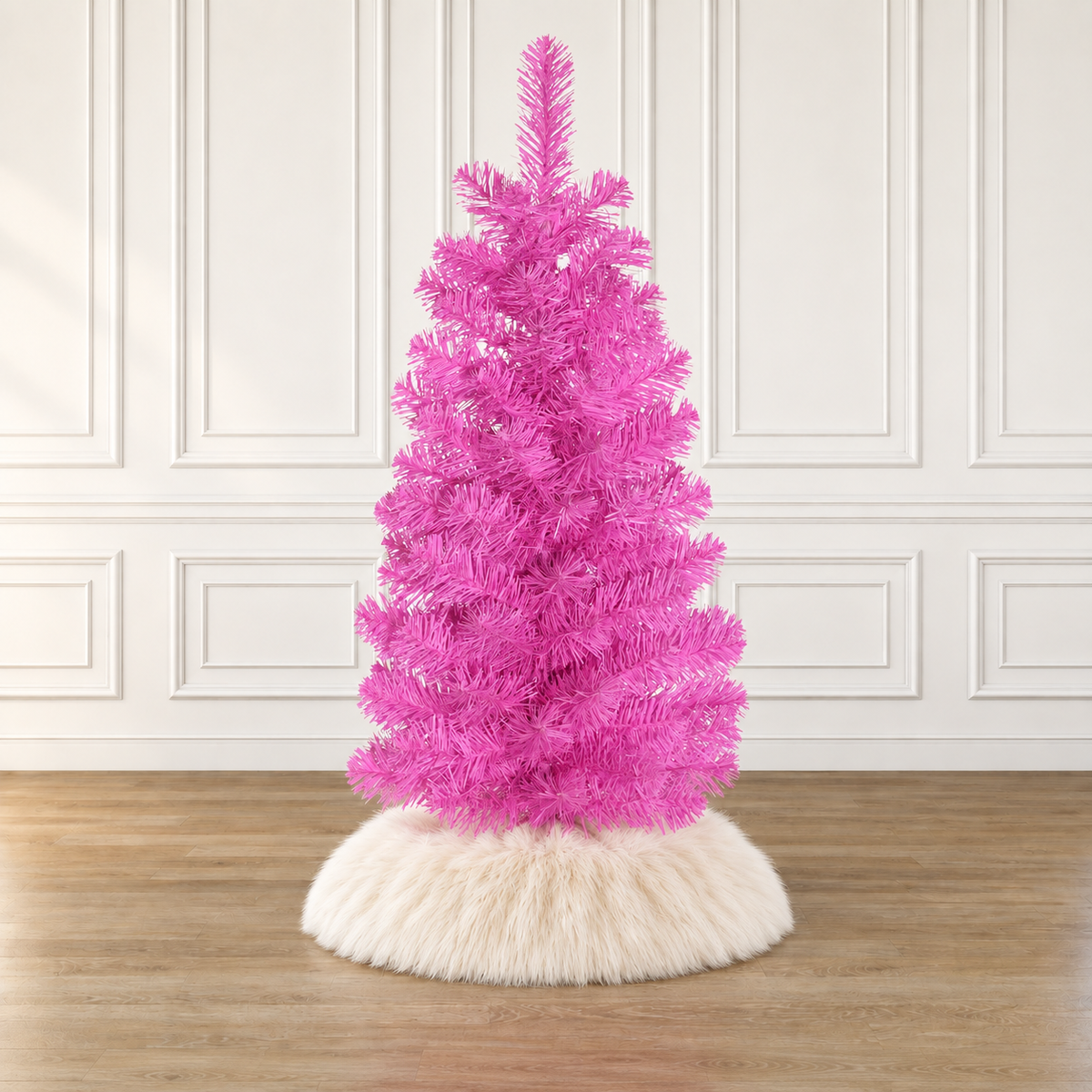 Pink tabletop Christmas tree with fluffy branches and white plastic stand base