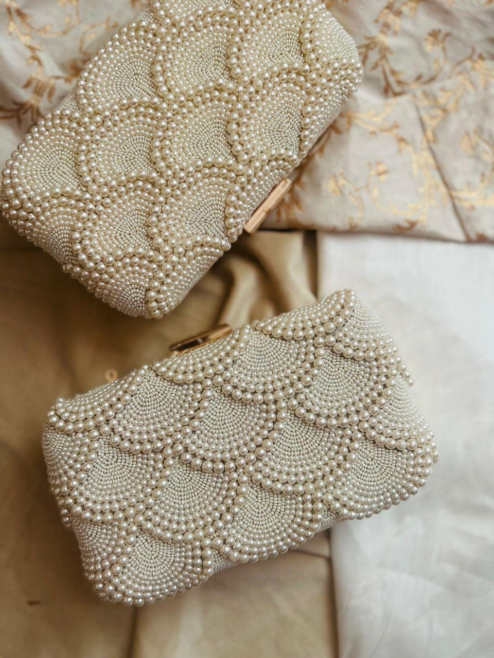 Pearl bead scalloped clutch with gold-tone frame, textured beadwork