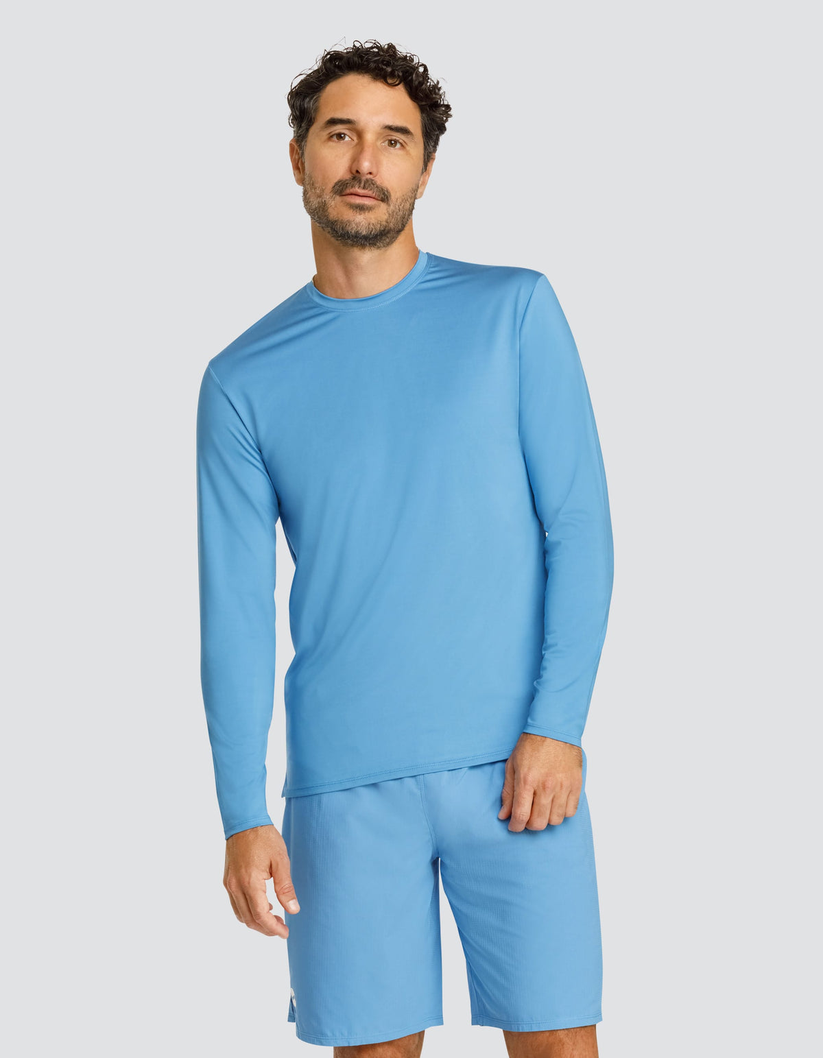 Blue long-sleeve crewneck top with straight hem