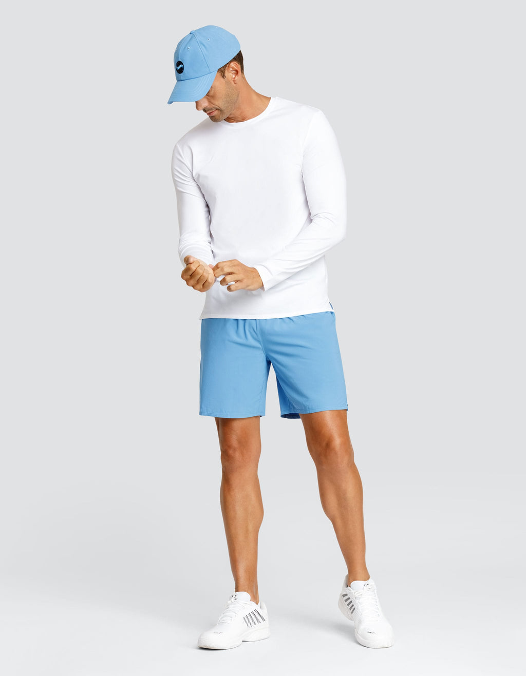 Chalk white long-sleeve crewneck top, smooth knit with straight hem
