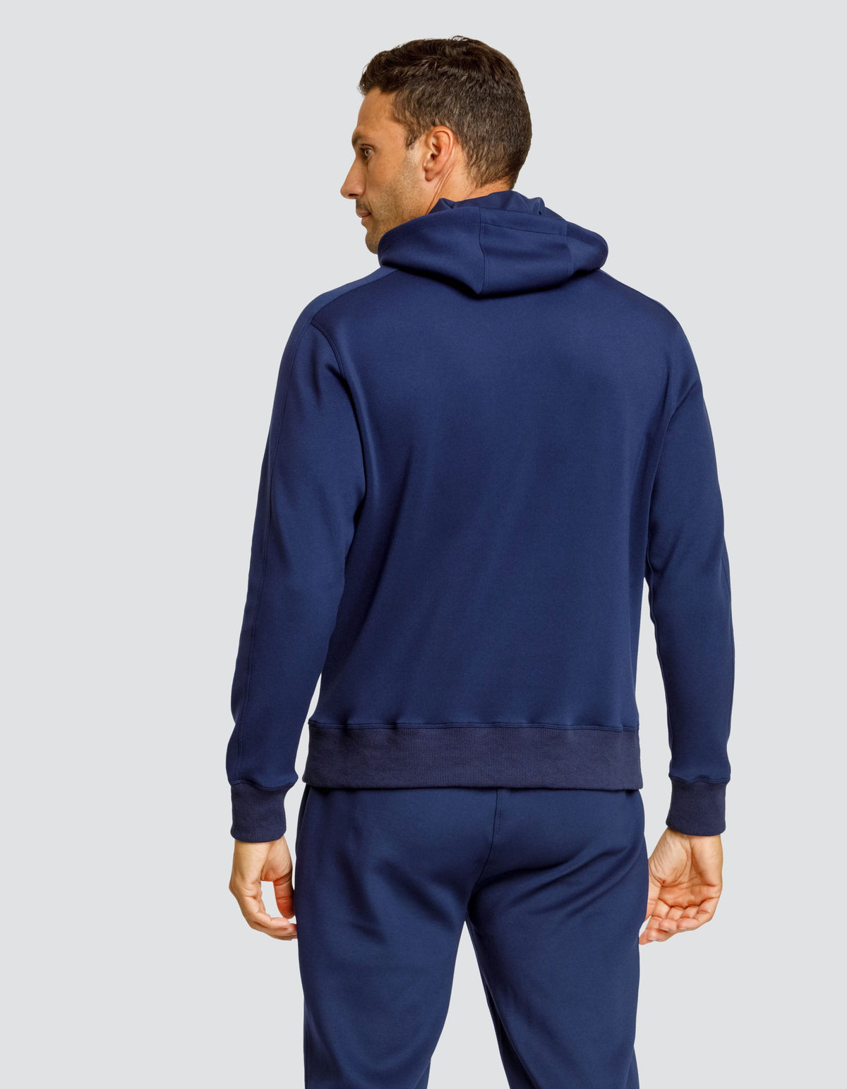 Navy hooded sweatshirt back view with drawstring hood and ribbed cuffs and hem