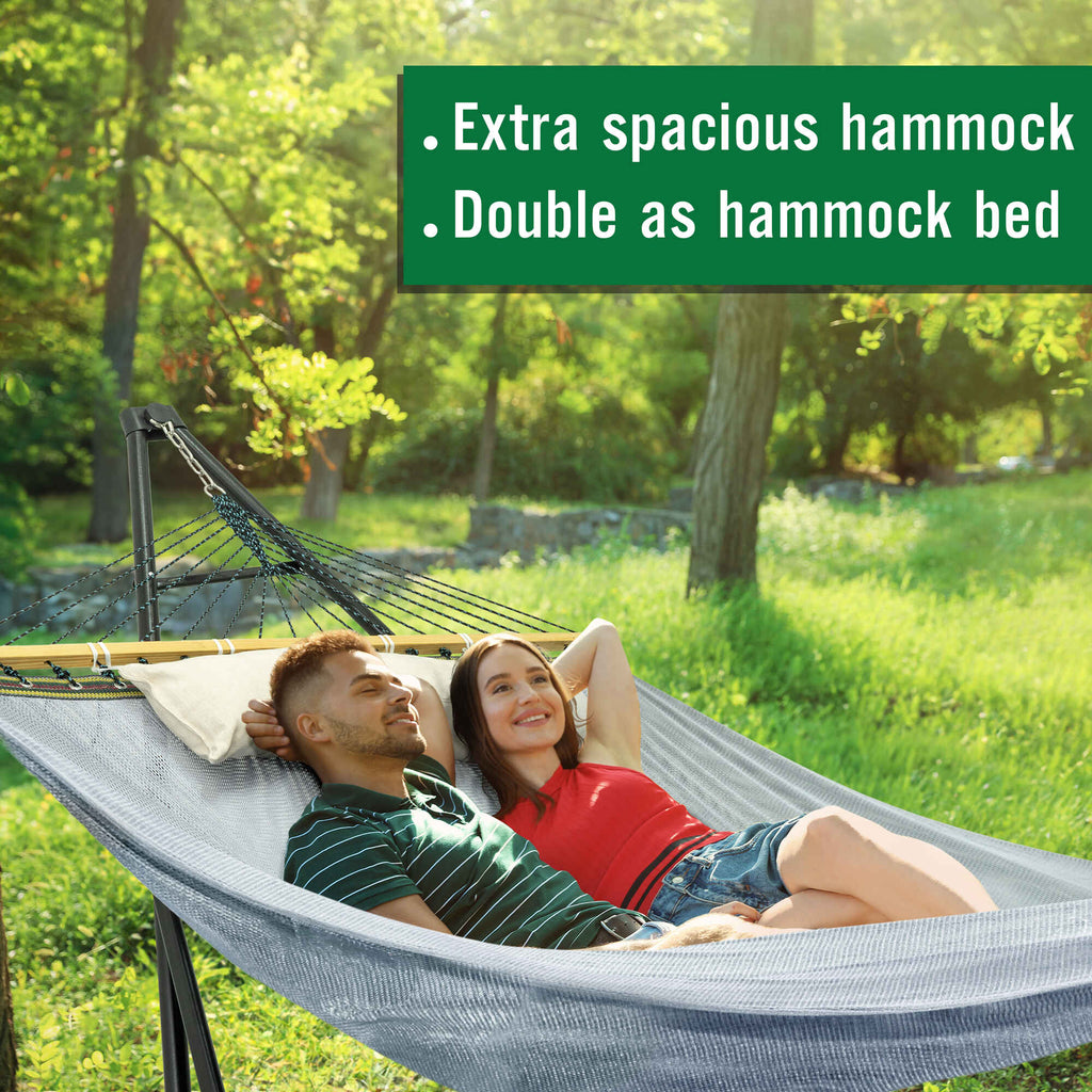 Gray double hammock with stand, two people relaxing while lying
