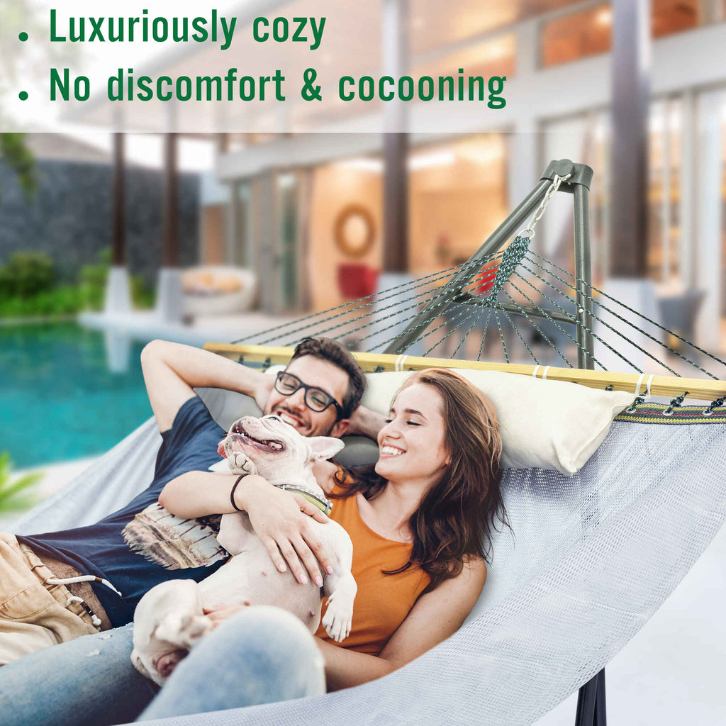 White hammock with stand, family lounging together