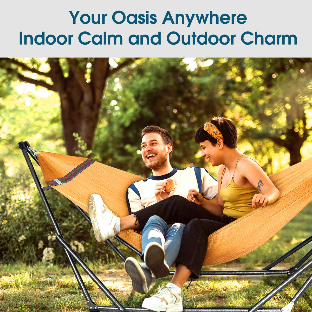 Orange hammock on a steel stand with two people relaxing
