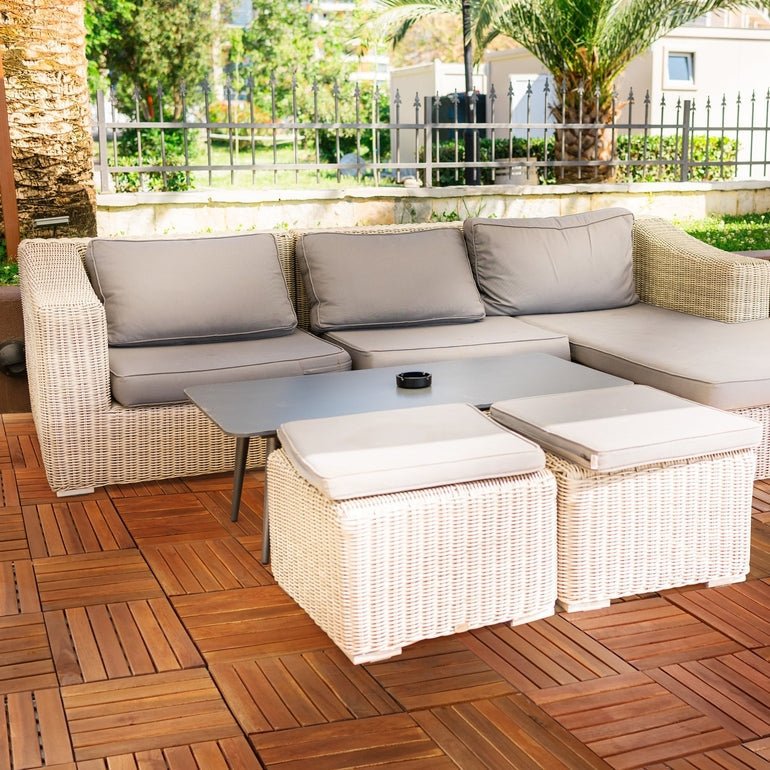 Brown wood deck tiles on patio, interlocking 6-slat flooring panels